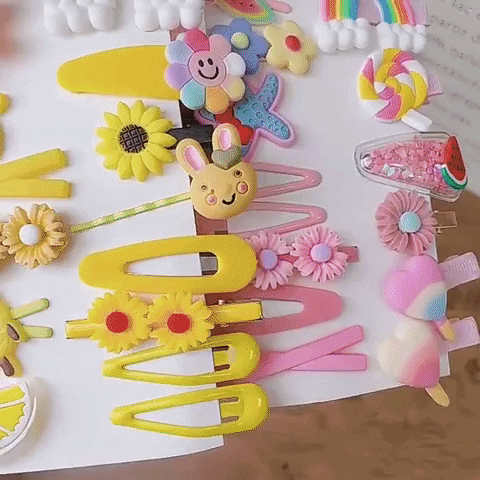 ADICIONA 42 PINZAS DE CARICATURAS